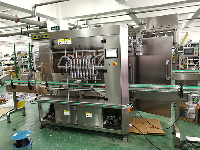 星火全自動辣椒醬灌裝機生產(chǎn)設備車間實拍圖