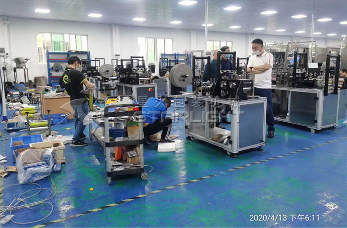 KN95口罩生產(chǎn)機械 半自動KN95口罩設(shè)備廠房拍攝圖
